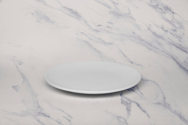 Ariane Vital Coupe 8 1/4" Vital Coupe - Warm White Porcelain Coupe Round Rimless Plate - 12/Case (AVCARN000011021) - iFoodservice Online