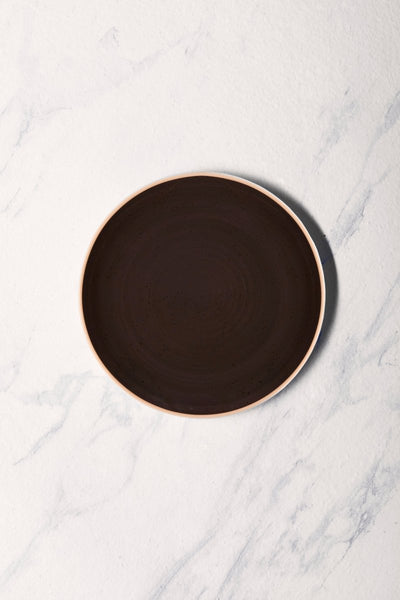 Ariane Vital Coupe 9 4/9" Twister Mokka Dark Brown Porcelain Coupe Round Rimless Plate - 6/Case (AVCARN263011024) - iFoodservice Online