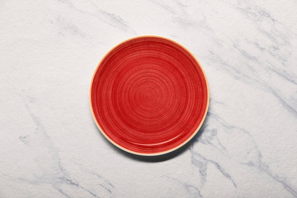 Ariane Vital Coupe 9 4/9" Twister Red Porcelain Coupe Round Rimless Plate - 6/Case (AVCARN204011024) - iFoodservice Online