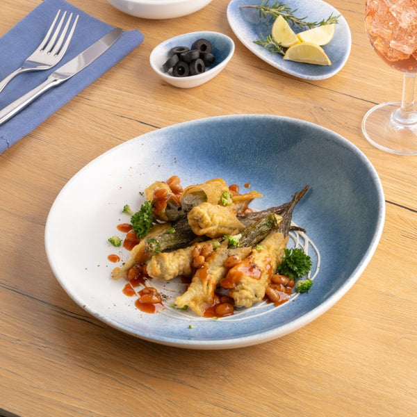 Ariane Vital Coupe 9 5/6" White & Blue Porcelain Coupe Round Deep Plate - 6/Case (AVCARND65012025) - iFoodservice Online