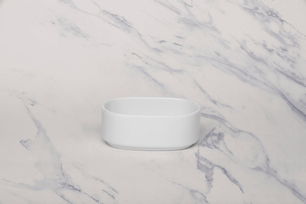 Ariane White 4 1/3" Prime - Warm Porcelain Sugar Pack Holder - 12/Case (APRARN000077002) - iFoodservice Online