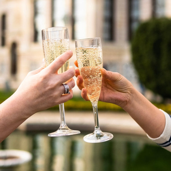 Turgla Rubikap Premium dia.2.25" h:8.5" 6 oz. Round Clear Polycarbonate Champagne Flute (Set of 50) (R - PRMCMP180CLR) - iFoodservice Online